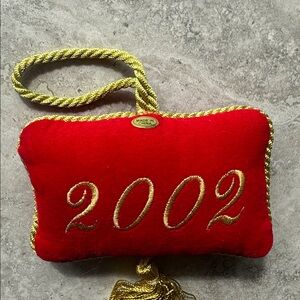 Vintage 2002 red velvet Noel door hanger with gold cord.